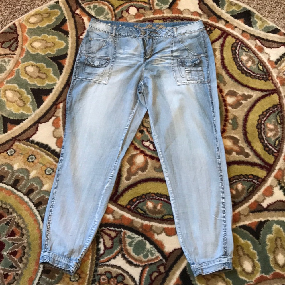 Jeans light weight denim.  About a size 13